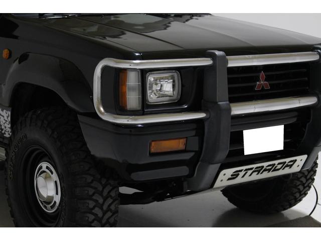 ブラックエディション　４ＷＤ　５ＭＴ　新品タイミングベルト交換　スキッドプレート　荷台チッピングコート済　クリスタルヘッドライト　イカリング　ＡＰＪ製ルーフラック　ＡＰＪ製ヴィンテージアルミ　フロントパワーウインドウ(24枚目)