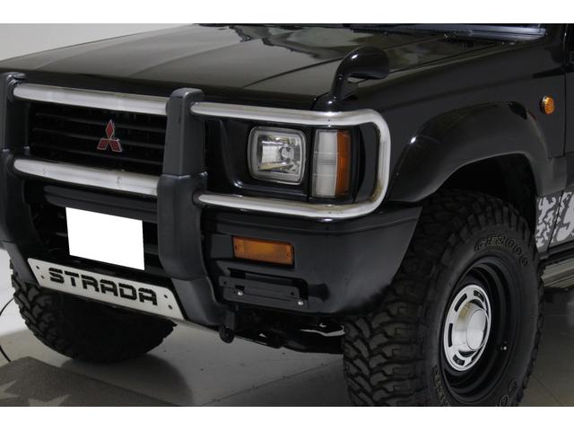 ストラーダ ブラックエディション　４ＷＤ　５ＭＴ　新品タイミングベルト交換　スキッドプレート　荷台チッピングコート済　クリスタルヘッドライト　イカリング　ＡＰＪ製ルーフラック　ＡＰＪ製ヴィンテージアルミ　フロントパワーウインドウ（26枚目）