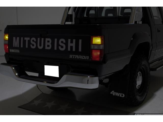 ブラックエディション　４ＷＤ　５ＭＴ　新品タイミングベルト交換　スキッドプレート　荷台チッピングコート済　クリスタルヘッドライト　イカリング　ＡＰＪ製ルーフラック　ＡＰＪ製ヴィンテージアルミ　フロントパワーウインドウ(44枚目)