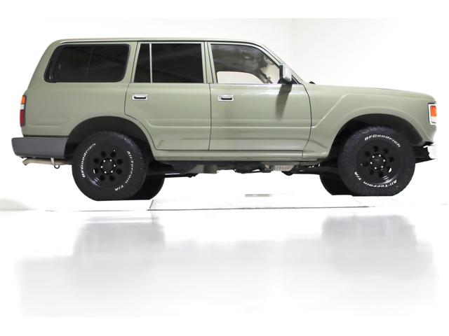 ＶＸリミテッド　４ＷＤ　　６０仕様　丸目フェイス　レザー調シートカバー　ジムライン１６インチＡＷ　ＢＦＧｏｏｄｒｉｃｈ　オールテレーンタイヤ　社外ウッド調ステアリンク　ナビ　ＴＶ　ＥＴＣ　ＡＢＳ　電動格納ミラー(18枚目)