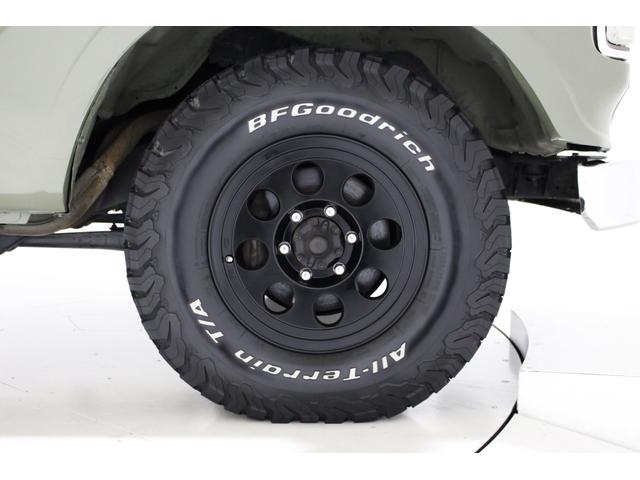 ランドクルーザー８０ ＶＸリミテッド　４ＷＤ　　６０仕様　丸目フェイス　レザー調シートカバー　ジムライン１６インチＡＷ　ＢＦＧｏｏｄｒｉｃｈ　オールテレーンタイヤ　社外ウッド調ステアリンク　ナビ　ＴＶ　ＥＴＣ　ＡＢＳ　電動格納ミラー（77枚目）