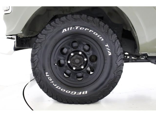 ランドクルーザー８０ ＶＸリミテッド　４ＷＤ　　６０仕様　丸目フェイス　レザー調シートカバー　ジムライン１６インチＡＷ　ＢＦＧｏｏｄｒｉｃｈ　オールテレーンタイヤ　社外ウッド調ステアリンク　ナビ　ＴＶ　ＥＴＣ　ＡＢＳ　電動格納ミラー（80枚目）