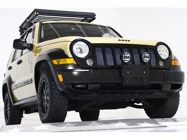 ジープ・チェロキー リミテッド　ディーラー車　４ＷＤ　社外１６インチアルミホイール　ルーフラック　ルーフレール　本革電動シート　シートヒーター付　オートクルーズコントロール付　キーレス　ＣＤ　Ｂｌｕｅｔｏｏｔｈ付　ＥＴＣ付（19枚目）