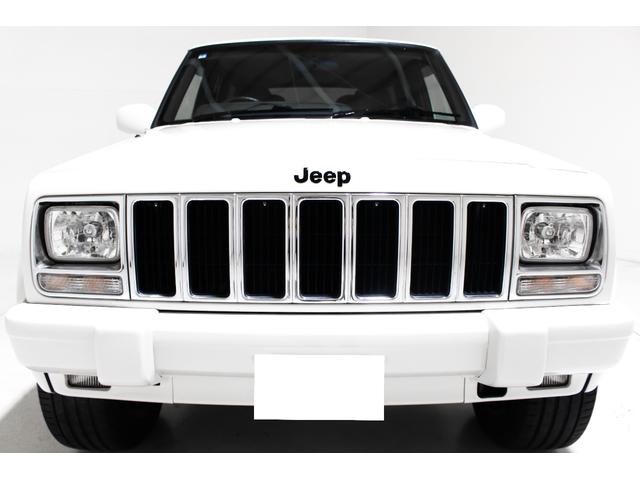 ジープ・チェロキー リミテッド　４ＷＤ　リフトアップ　社外１８インチアルミホイール　社外ワイドオーバーフェンダー　メッキグリル　クリスタルヘッドライト　クリアコーナー　クリアウィンカー　クリアサイドマーカー　本革電動シート　ＥＴＣ（25枚目）