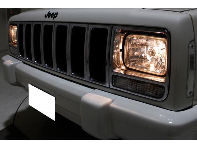 ジープ・チェロキー リミテッド　４ＷＤ　リフトアップ　社外１８インチアルミホイール　社外ワイドオーバーフェンダー　メッキグリル　クリスタルヘッドライト　クリアコーナー　クリアウィンカー　クリアサイドマーカー　本革電動シート　ＥＴＣ（35枚目）