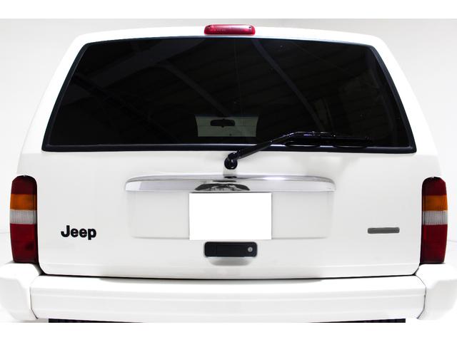 ジープ・チェロキー リミテッド　４ＷＤ　リフトアップ　社外１８インチアルミホイール　社外ワイドオーバーフェンダー　メッキグリル　クリスタルヘッドライト　クリアコーナー　クリアウィンカー　クリアサイドマーカー　本革電動シート　ＥＴＣ（37枚目）