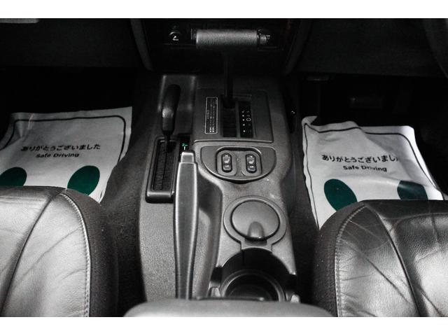ジープ・チェロキー リミテッド　４ＷＤ　リフトアップ　社外１８インチアルミホイール　社外ワイドオーバーフェンダー　メッキグリル　クリスタルヘッドライト　クリアコーナー　クリアウィンカー　クリアサイドマーカー　本革電動シート　ＥＴＣ（62枚目）