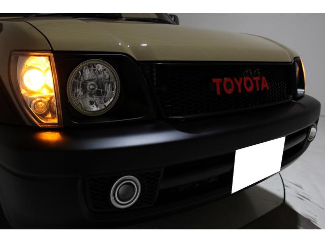 ランドクルーザープラド TX リミテッド 4WD 丸目仕様 APJ製ヴィンテージグリル APJ製レザー調シートカバー APJ製ヴィンテージ16インチアルミホイール LEDテールランプ LEDイカリングフォグランプ 8人乗3列シート(27枚目)