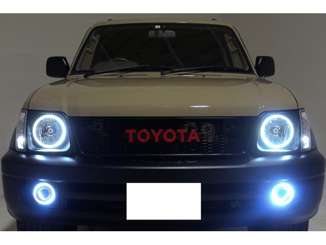 ランドクルーザープラド TX リミテッド 4WD 丸目仕様 APJ製ヴィンテージグリル APJ製レザー調シートカバー APJ製ヴィンテージ16インチアルミホイール LEDテールランプ LEDイカリングフォグランプ 8人乗3列シート(31枚目)