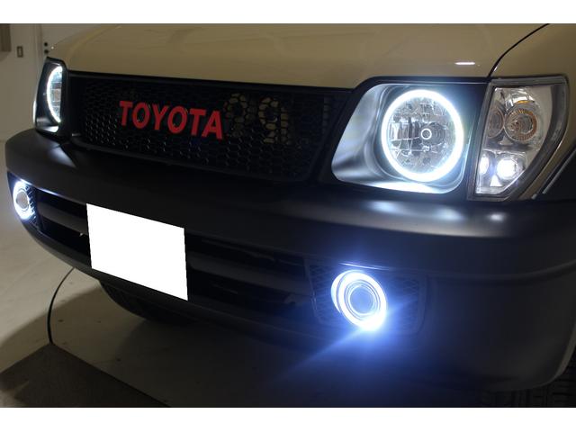 ランドクルーザープラド TX リミテッド 4WD 丸目仕様 APJ製ヴィンテージグリル APJ製レザー調シートカバー APJ製ヴィンテージ16インチアルミホイール LEDテールランプ LEDイカリングフォグランプ 8人乗3列シート(32枚目)