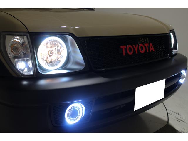 ランドクルーザープラド TX リミテッド 4WD 丸目仕様 APJ製ヴィンテージグリル APJ製レザー調シートカバー APJ製ヴィンテージ16インチアルミホイール LEDテールランプ LEDイカリングフォグランプ 8人乗3列シート(33枚目)