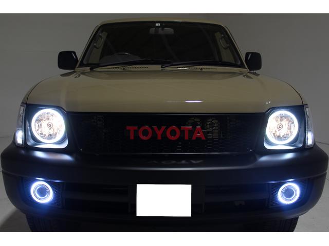 ランドクルーザープラド TX リミテッド 4WD 丸目仕様 APJ製ヴィンテージグリル APJ製レザー調シートカバー APJ製ヴィンテージ16インチアルミホイール LEDテールランプ LEDイカリングフォグランプ 8人乗3列シート(34枚目)