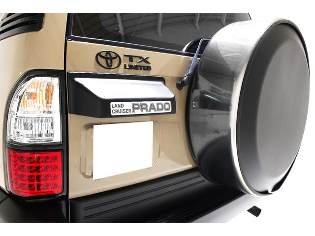 ランドクルーザープラド TX リミテッド 4WD 丸目仕様 APJ製ヴィンテージグリル APJ製レザー調シートカバー APJ製ヴィンテージ16インチアルミホイール LEDテールランプ LEDイカリングフォグランプ 8人乗3列シート(36枚目)