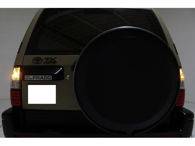 ランドクルーザープラド TX リミテッド 4WD 丸目仕様 APJ製ヴィンテージグリル APJ製レザー調シートカバー APJ製ヴィンテージ16インチアルミホイール LEDテールランプ LEDイカリングフォグランプ 8人乗3列シート(40枚目)