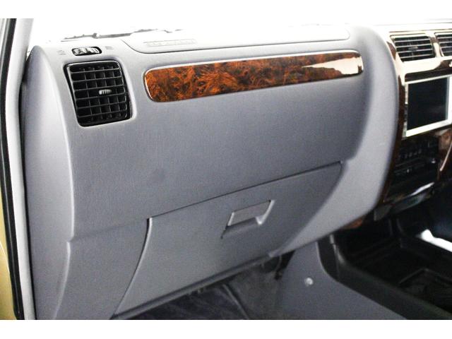 ランドクルーザープラド TX リミテッド 4WD 丸目仕様 APJ製ヴィンテージグリル APJ製レザー調シートカバー APJ製ヴィンテージ16インチアルミホイール LEDテールランプ LEDイカリングフォグランプ 8人乗3列シート(63枚目)