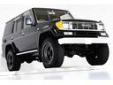 ＳＸワイド　４ＷＤ　リフトアップ　新品タイミングベルト交換　オールクロームメッキグリル　７０仕様クロームメッキフロントバンパー　ブラックレザー調シートカバー　　キーレス　３列シート　１ナンバー登録可能　寒冷地仕様（19枚目）