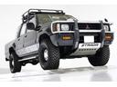 ブラックエディション　４ＷＤ　５ＭＴ　新品タイミングベルト交換　スキッドプレート　荷台チッピングコート済　クリスタルヘッドライト　イカリング　ＡＰＪ製ルーフラック　ＡＰＪ製ヴィンテージアルミ　フロントパワーウインドウ（19枚目）