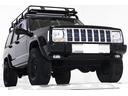 リミテッド　ディーラー車　４ＷＤ　リフトアップ　ＡＰＪ製ルーフラック　社外コンビーテールランプ　社外１５インチホイール　本革電動シート　フロントクロームメッキグリル　前後クロームメッキバンパー　盗難防止イモビ付き（19枚目）