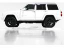 リミテッド　４ＷＤ　リフトアップ　社外１８インチアルミホイール　社外ワイドオーバーフェンダー　メッキグリル　クリスタルヘッドライト　クリアコーナー　クリアウィンカー　クリアサイドマーカー　本革電動シート　ＥＴＣ（9枚目）