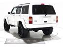 リミテッド　４ＷＤ　リフトアップ　社外１８インチアルミホイール　社外ワイドオーバーフェンダー　メッキグリル　クリスタルヘッドライト　クリアコーナー　クリアウィンカー　クリアサイドマーカー　本革電動シート　ＥＴＣ（10枚目）