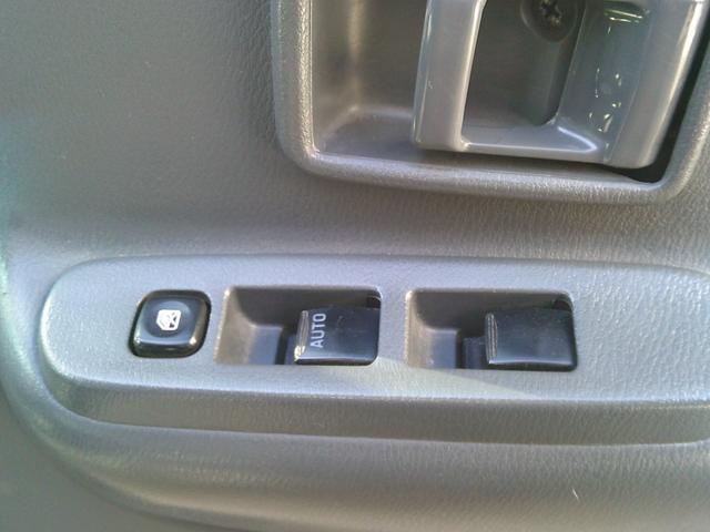 アトラストラック 　４ＷＤ　１．４５ｔ幌ウイング　ボディ内寸３０９０ｘ１５９０ｘ１８６０バックカメラ付き　エアコン・パワステ・パワーウインドウ　運転席側エアバッグ付き　５速マニュアル　切り替え４ＷＤＨ／Ｌ付（7枚目）