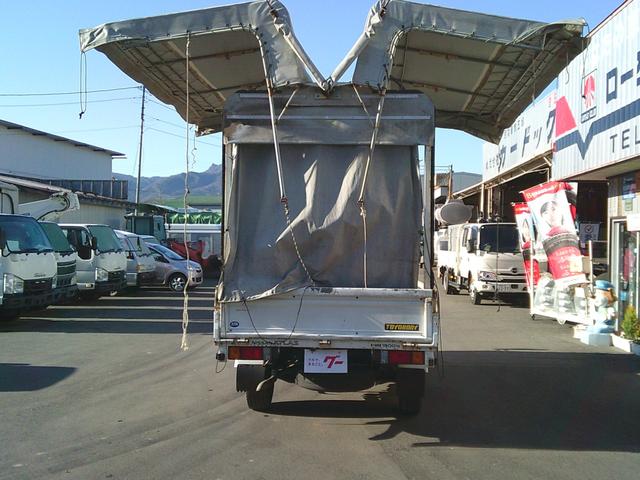 アトラストラック 　４ＷＤ　１．４５ｔ幌ウイング　ボディ内寸３０９０ｘ１５９０ｘ１８６０バックカメラ付き　エアコン・パワステ・パワーウインドウ　運転席側エアバッグ付き　５速マニュアル　切り替え４ＷＤＨ／Ｌ付（15枚目）