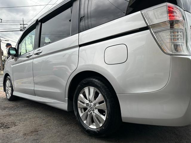 ステップワゴンスパーダ Z 新品タイヤ 純正HDDナビ W電動スライドドア フリップダウンモニター スマートキー バックカメラ フルセグ Bluetooth 純正16インチアルミホイール ETC HIDライト ドライブレコーダー(13枚目)