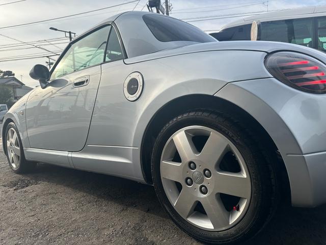 コペン ２ｎｄアニバーサリーエディション　純正レカロシート　社外ナビ　社外ＬＥＤテールランプ　ＥＴＣ　ＭＯＭＯステアリング　シートヒーター　ワンセグ　ＥＴＣ　キーレス　ＨＩＤライト　純正１５インチアルミホイール（15枚目）