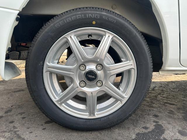 クリッパーバン DX 新品タイヤ タイミングベルト交換 社外14インチアルミホイール ヘッドライトレベライザー スペアキー 取扱説明書 整備点検記録簿(12枚目)