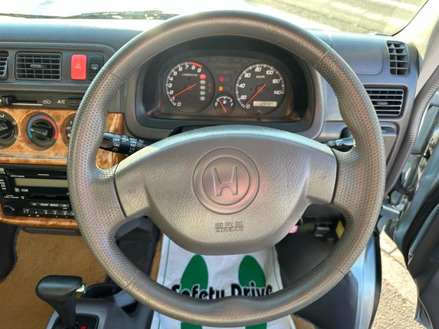 バモス Ｌ　タイミングベルト交換　ホンダ純正１４インチアルミホイール　キーレス　ドアバイザー　純正オーディオ　ウッドパネル　取説、記録簿（9枚目）