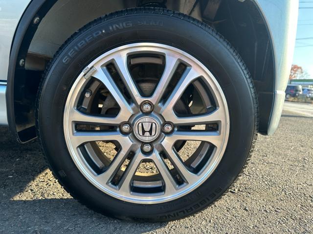 バモス Ｌ　タイミングベルト交換　ホンダ純正１４インチアルミホイール　キーレス　ドアバイザー　純正オーディオ　ウッドパネル　取説、記録簿（12枚目）