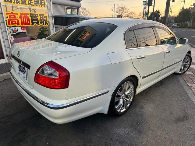 シーマ ３００Ｇ　中期モデル　新品タイヤ　インタークーラーターボ　純正ナビ　パワーシート　オットマン　バックカメラ　１８インチアルミホイール　マルチプロジェクターＨＩＤ　ＥＴＣ　キーレス　ドアバイザー　レーダー探知機（46枚目）