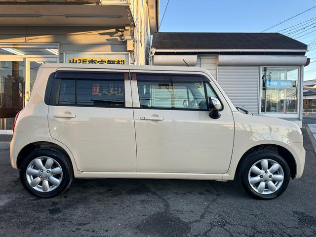 アルトラパン Ｘ　純正オーディオ　純正１４インチアルミホイール　スマートキー　プッシュスタート　ヘッドライトレベライザー　ドアバイザー　取説記録簿　タイミングチェーンエンジン（49枚目）