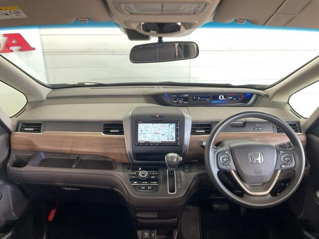 フリード Ｇ・ホンダセンシング　純正メモリーナビ　シートヒーター　ＥＴＣ車載器　両側パワースライドドア　追突被害軽減ブレーキ　ｉストップ　Ｗエアバッグ　パワーウィンドウ　１オ－ナ－　アクティブクルーズコントロール　スマートキ　ＶＳＡ（7枚目）