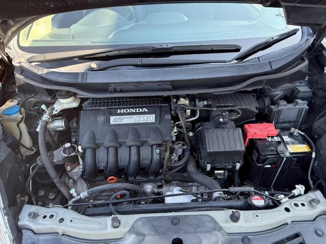 フィットシャトルハイブリッド ハイブリッド・スマートセレクション メモリーナビ HIDヘッドライト ETC バックカメラ オートクルーズコントロール アイドリングストップ キーレスエントリー 盗難防止システム 横滑り防止装置 衝突安全ボディ エアバッグ エアコン(6枚目)