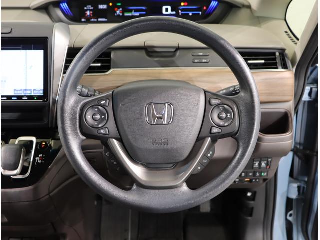 フリードハイブリッド ハイブリッド・Gホンダセンシング 軽減ブレーキ キーフリーシステム DVD再生可能 ECON 後カメラ Aクルーズ 地デジフルセグTV LEDヘッドランプ シートH 横滑防止 ドライブレコーダ USB(15枚目)