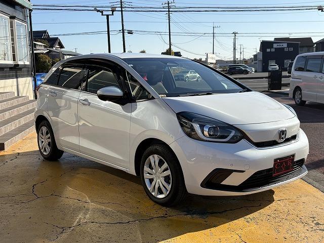 フィット ｅ：ＨＥＶホーム　衝突被害軽減ブレーキ　レーンキープアシスト　アダプティブクルーズコントロール　クリアランスソナー　オートハイビーム　ＬＥＤオートライト　ステアリングリモコン　純正ナビ　バックカメラ　Ｂｌｕｅｔｏｏｔｈ（15枚目）