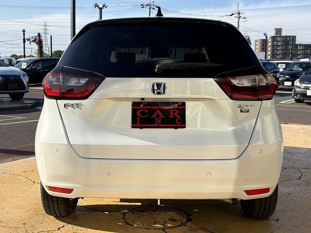 フィット ｅ：ＨＥＶホーム　衝突被害軽減ブレーキ　レーンキープアシスト　アダプティブクルーズコントロール　クリアランスソナー　オートハイビーム　ＬＥＤオートライト　ステアリングリモコン　純正ナビ　バックカメラ　Ｂｌｕｅｔｏｏｔｈ（18枚目）