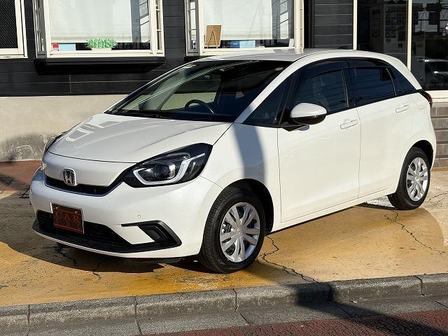 フィット ｅ：ＨＥＶホーム　衝突被害軽減ブレーキ　レーンキープアシスト　アダプティブクルーズコントロール　クリアランスソナー　オートハイビーム　ＬＥＤオートライト　ステアリングリモコン　純正ナビ　バックカメラ　Ｂｌｕｅｔｏｏｔｈ（21枚目）