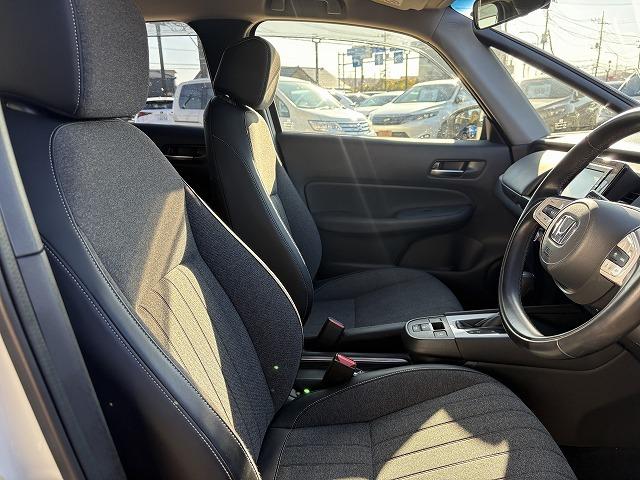 フィット ｅ：ＨＥＶホーム　衝突被害軽減ブレーキ　レーンキープアシスト　アダプティブクルーズコントロール　クリアランスソナー　オートハイビーム　ＬＥＤオートライト　ステアリングリモコン　純正ナビ　バックカメラ　Ｂｌｕｅｔｏｏｔｈ（26枚目）