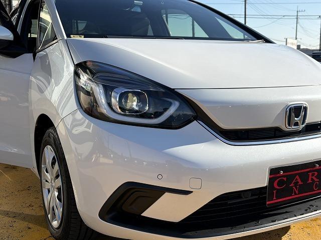 フィット ｅ：ＨＥＶホーム　衝突被害軽減ブレーキ　レーンキープアシスト　アダプティブクルーズコントロール　クリアランスソナー　オートハイビーム　ＬＥＤオートライト　ステアリングリモコン　純正ナビ　バックカメラ　Ｂｌｕｅｔｏｏｔｈ（40枚目）