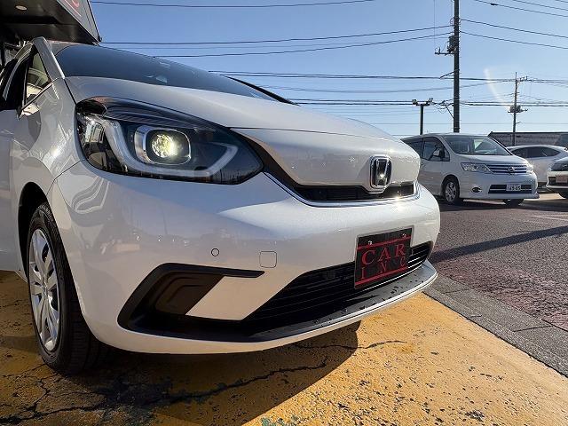 フィット ｅ：ＨＥＶホーム　衝突被害軽減ブレーキ　レーンキープアシスト　アダプティブクルーズコントロール　クリアランスソナー　オートハイビーム　ＬＥＤオートライト　ステアリングリモコン　純正ナビ　バックカメラ　Ｂｌｕｅｔｏｏｔｈ（42枚目）