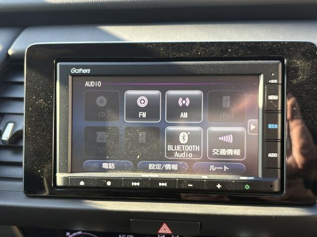 フィット ｅ：ＨＥＶホーム　衝突被害軽減ブレーキ　レーンキープアシスト　アダプティブクルーズコントロール　クリアランスソナー　オートハイビーム　ＬＥＤオートライト　ステアリングリモコン　純正ナビ　バックカメラ　Ｂｌｕｅｔｏｏｔｈ（49枚目）