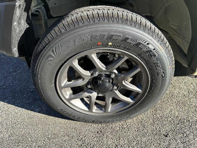 ジムニー ＸＣ　４ＷＤ　ＥＴＣ　安全運転支援システム　純正９インチナビ　純正スターター　スペアタイヤカバー（27枚目）