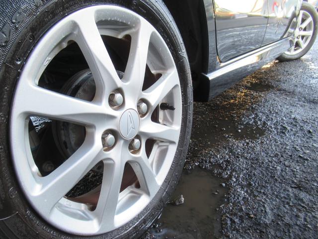 ムーヴ カスタム Xリミテッド /車検:2年付き/エアロ+リアスポ/社外ナビ/DVD/Bluetooth/純正14AW/HID/フォグ/革巻きステア/スマ-トキ-/ベンチシ-ト/AUTOエアコン/ドアバイザ-/PVガラス/Tチェ-ン(13枚目)