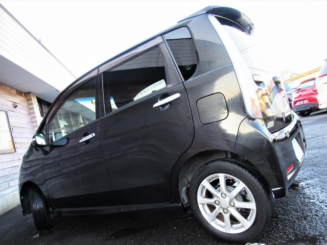 ムーヴ カスタム Xリミテッド /車検:2年付き/エアロ+リアスポ/社外ナビ/DVD/Bluetooth/純正14AW/HID/フォグ/革巻きステア/スマ-トキ-/ベンチシ-ト/AUTOエアコン/ドアバイザ-/PVガラス/Tチェ-ン(33枚目)