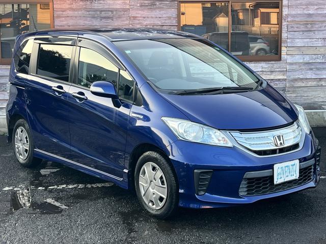 フリードハイブリッド ジャストセレクション　／検：２年付／走：４．３万ｋｍ／外ナビ／フリップダウン／Ｂカメラ／フルセグ／ＤＶＤ／Ｂｌｕｅｔｏｏｔｈ／左側電動スライド／ＨＩＤ／ＥＴＣ／スマキ－／クルコン／ＡＵＴＯエアコン／ドアバイザ－／Ｔチェ－ン（8枚目）