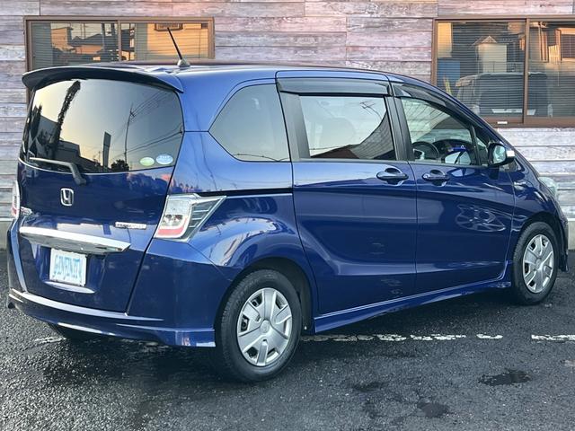 フリードハイブリッド ジャストセレクション　／検：２年付／走：４．３万ｋｍ／外ナビ／フリップダウン／Ｂカメラ／フルセグ／ＤＶＤ／Ｂｌｕｅｔｏｏｔｈ／左側電動スライド／ＨＩＤ／ＥＴＣ／スマキ－／クルコン／ＡＵＴＯエアコン／ドアバイザ－／Ｔチェ－ン（10枚目）