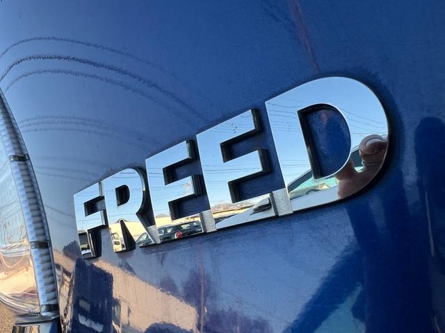 フリードハイブリッド ジャストセレクション　／検：２年付／走：４．３万ｋｍ／外ナビ／フリップダウン／Ｂカメラ／フルセグ／ＤＶＤ／Ｂｌｕｅｔｏｏｔｈ／左側電動スライド／ＨＩＤ／ＥＴＣ／スマキ－／クルコン／ＡＵＴＯエアコン／ドアバイザ－／Ｔチェ－ン（29枚目）