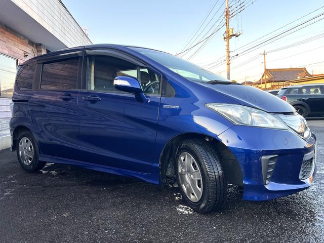 フリードハイブリッド ジャストセレクション　／検：２年付／走：４．３万ｋｍ／外ナビ／フリップダウン／Ｂカメラ／フルセグ／ＤＶＤ／Ｂｌｕｅｔｏｏｔｈ／左側電動スライド／ＨＩＤ／ＥＴＣ／スマキ－／クルコン／ＡＵＴＯエアコン／ドアバイザ－／Ｔチェ－ン（35枚目）